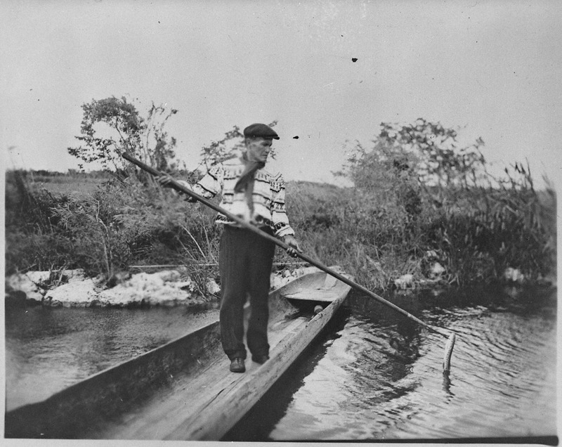 A Seminole Spearing A Garfish From A Dugout Florida