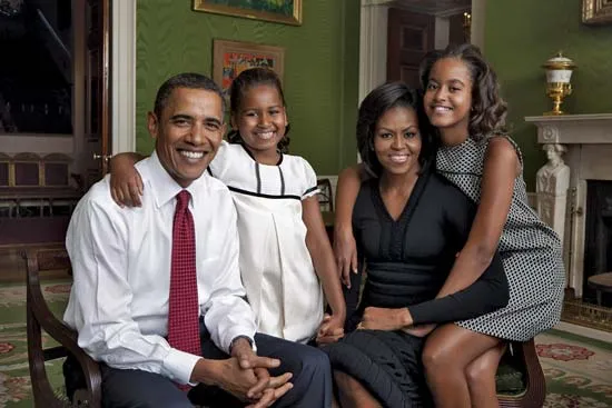 Michelle Obama with Barak Obama and two daughters
