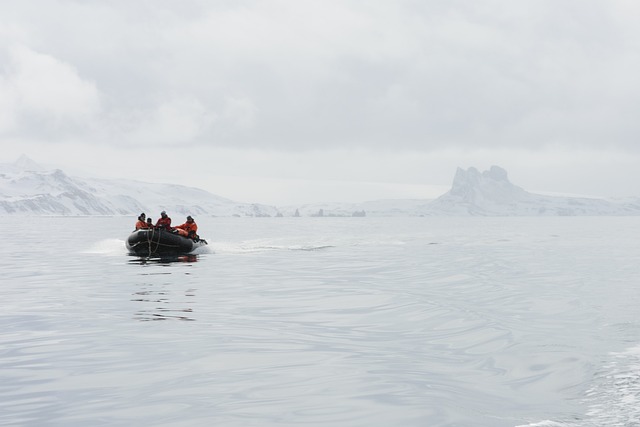 People exploring Antarctica on Boat
