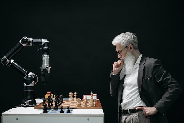 Man Playing Chess with Robot