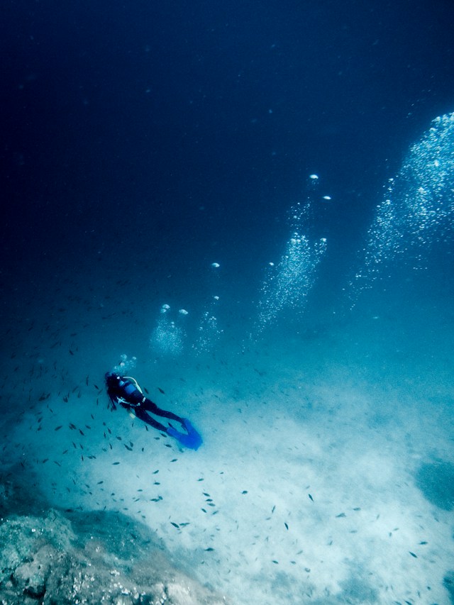 Scuba diver near water surface